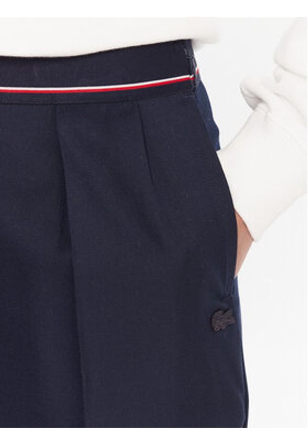 Lacoste Spodnie materiałowe HF5307 Granatowy Relaxed Fit. Kolor: niebieski. Materiał: wełna, syntetyk