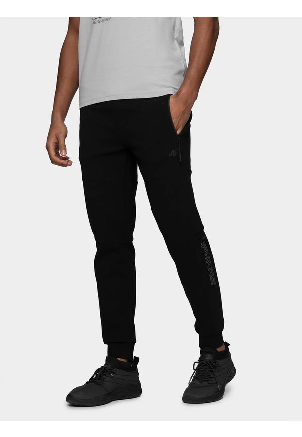 4f - Spodnie dresowe męskie. Kolor: czarny. Materiał: dresówka. Sport: fitness