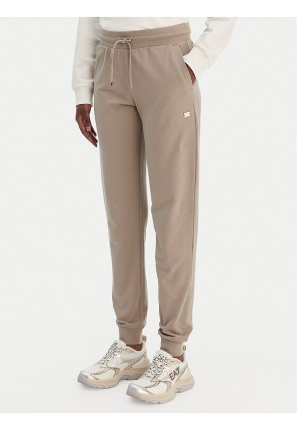 EA7 Emporio Armani Spodnie dresowe 7W000461 AF13135 U6167 Beżowy Regular Fit. Kolor: beżowy. Materiał: bawełna