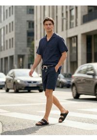 Sinsay - Bawełniane szorty jeansowe - granatowy. Kolor: niebieski. Materiał: jeans, bawełna