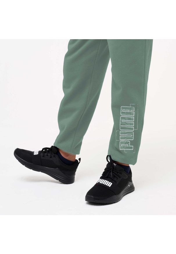 Spodnie dresowe dla dzieci Puma. Kolor: beżowy. Materiał: dresówka. Sport: joga i pilates