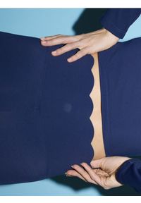 Reserved - Legginsy z ozdobnym wykończeniem - granatowy. Kolor: niebieski. Materiał: dzianina #1