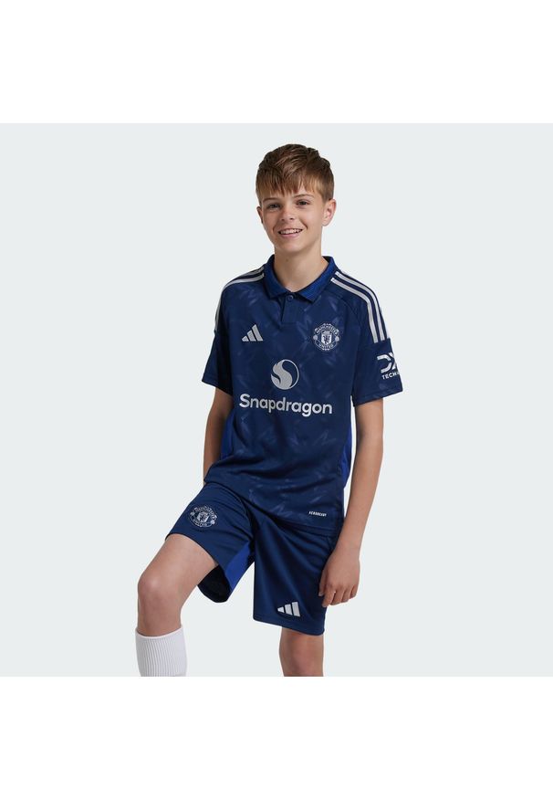 Adidas - Szorty Manchester United 24/25 Away Kids. Kolor: niebieski. Materiał: materiał