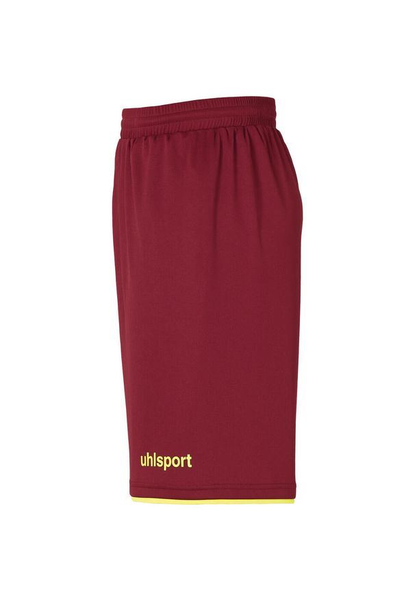 UHLSPORT - Krótki Uhlsport Club. Kolor: czerwony, wielokolorowy, żółty. Długość: krótkie. Sport: piłka nożna