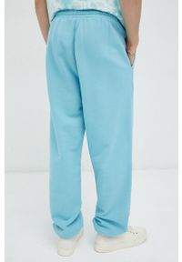 Levi's® - Levi's spodnie dresowe bawełniane Gold Tab™ kolor niebieski z aplikacją. Kolor: niebieski. Materiał: bawełna, dresówka. Wzór: aplikacja #2