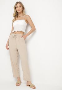 Born2be - Beżowe Spodnie Luźne z Kieszeniami i Gumką w Talii oraz Sznurkiem Enivia. Okazja: na co dzień. Kolor: beżowy. Styl: casual, elegancki #7