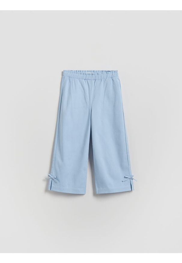 Reserved - Spodnie z kokardkami - jasnoniebieski. Kolor: niebieski. Materiał: bawełna