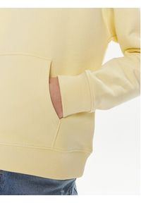 Tommy Jeans Bluza Badge DW0DW17326 Żółty Boxy Fit. Kolor: żółty. Materiał: bawełna