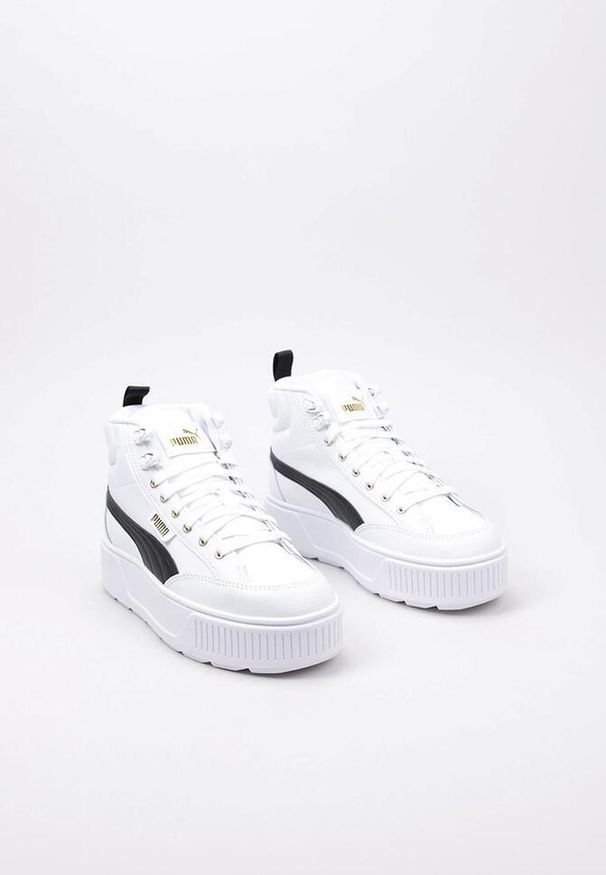 Buty do chodzenia damskie Puma Karmen Mid. Wysokość cholewki: za kostkę. Zapięcie: sznurówki. Kolor: biały, wielokolorowy, czarny. Materiał: materiał, syntetyk. Szerokość cholewki: normalna. Sport: turystyka piesza