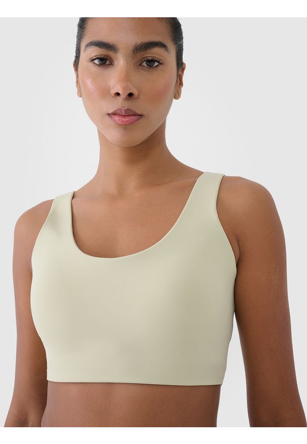 4f - 4F Biustonosz treningowy ze średnim wsparciem - zielony L. Kolor: zielony. Materiał: dzianina, materiał, syntetyk, włókno, jersey, guma, elastan. Wzór: jednolity, gładki, ze splotem. Sport: bieganie, kolarstwo, fitness