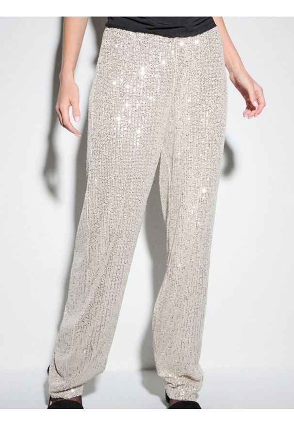 Sinsay - Spodnie wide leg z połyskującymi cekinami - srebrny. Kolor: srebrny