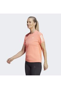 Koszulka do biegania damska Adidas Own the Run Tee. Kolor: pomarańczowy. Materiał: materiał. Sport: bieganie