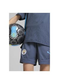 Puma - Młodzieżowe szorty treningowe Manchester City PUMA Inky Blue Magic. Kolor: niebieski