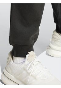 Adidas - adidas Spodnie dresowe IR8360 Czarny Regular Fit. Kolor: czarny. Materiał: dresówka, bawełna #4