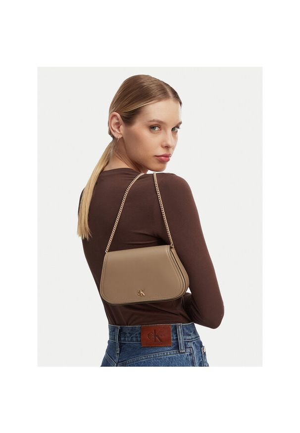 Torebka Calvin Klein. Kolor: beżowy