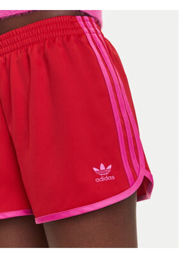 Adidas - adidas Szorty sportowe adicolor 3-Stripes Sprinter JZ3513 Czerwony Loose Fit. Kolor: czerwony. Materiał: syntetyk