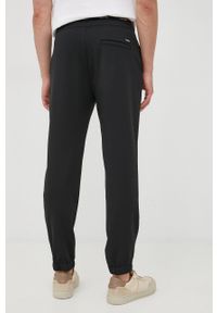 Calvin Klein spodnie dresowe męskie kolor czarny gładkie. Kolor: czarny. Materiał: dresówka. Wzór: gładki #4