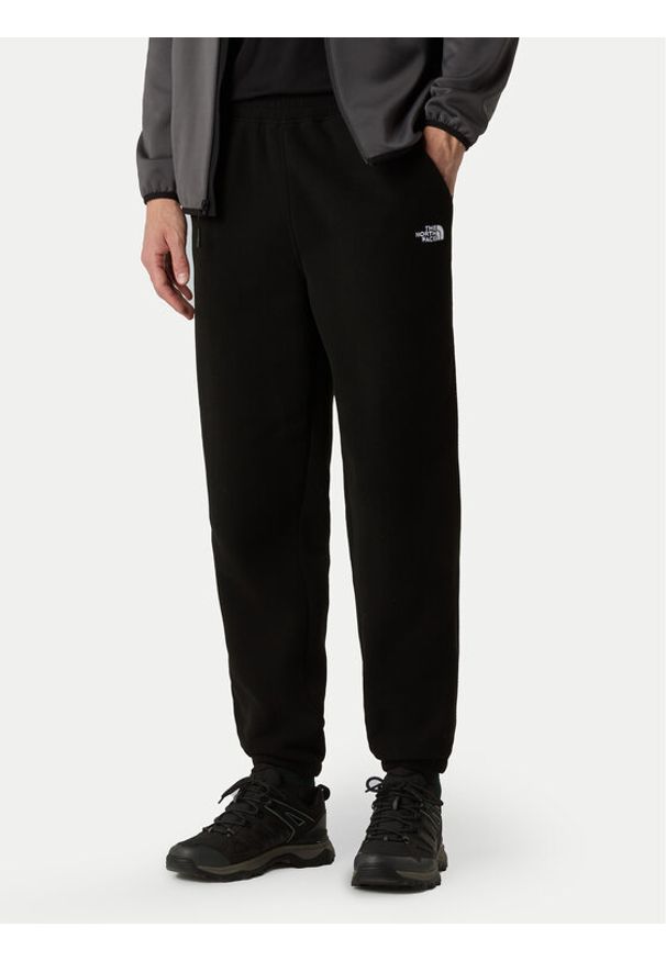 The North Face Spodnie dresowe Glacier NF0A8D0T Czarny Regular Fit. Kolor: czarny. Materiał: syntetyk
