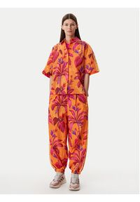 Adidas - adidas Spodnie dresowe FARM Premium JD6301 Pomarańczowy Loose Fit. Kolor: pomarańczowy. Materiał: syntetyk #2