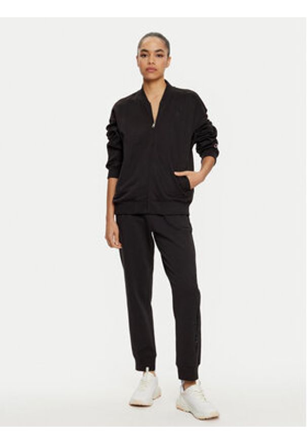 Champion Spodnie dresowe 117584 Czarny Slim Fit. Kolor: czarny. Materiał: bawełna