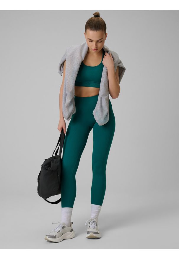 4f - 4F Biustonosz treningowy bezszwowy z niskim wsparciem damski - turkusowy XS/S. Kolor: turkusowy. Materiał: włókno, materiał. Rodzaj stanika: wyciągane miseczki. Sport: fitness