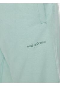 New Balance Spodnie dresowe MP23551 Zielony Relaxed Fit. Kolor: zielony. Materiał: bawełna