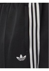 Adidas - adidas Spodnie dresowe adicolor Spacer KS7433 Czarny Baggy Fit. Kolor: czarny. Materiał: bawełna. Sport: turystyka piesza #4