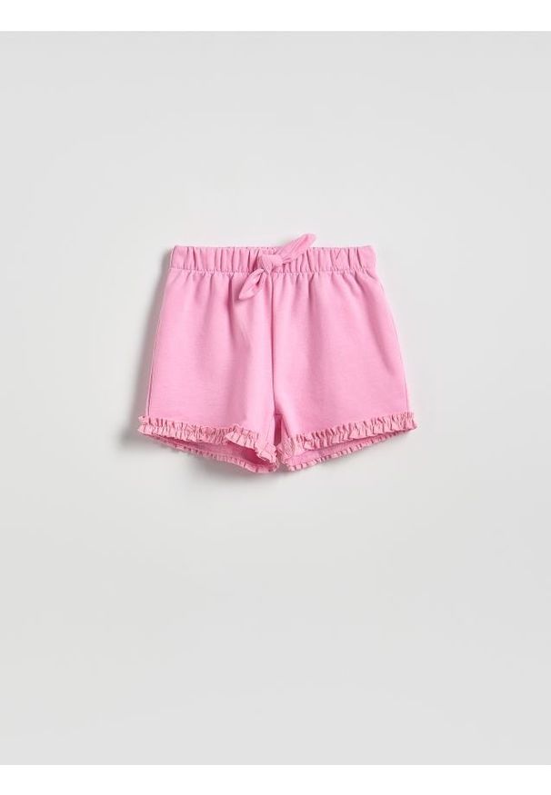 Reserved - Szorty z falbanką - różowy. Kolor: różowy. Materiał: bawełna