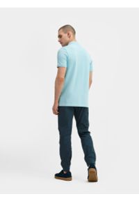 4f - Spodnie casual joggery męskie. Kolor: niebieski. Materiał: tkanina, materiał, bawełna