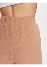 DKNY Sport Spodnie dresowe DP3P3286 Brązowy Regular Fit. Kolor: brązowy. Materiał: bawełna, syntetyk