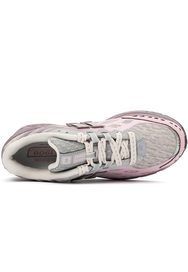 Buty unisex New Balance U1906WFA – różowe. Kolor: różowy. Materiał: guma, materiał, syntetyk. Szerokość cholewki: normalna. Sport: turystyka piesza