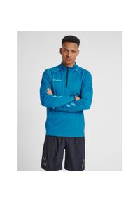 Bluza Hummel Half Zip hmlAUTHENTIC Pro. Kolor: turkusowy, niebieski, wielokolorowy. Sezon: jesień, zima. Sport: fitness