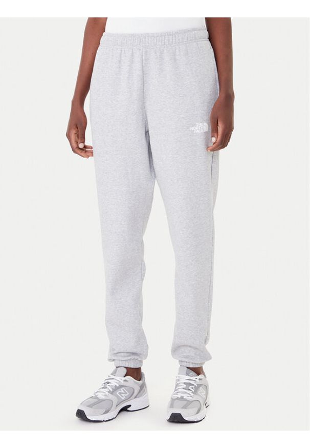 The North Face Spodnie dresowe Simple Dome NF0A8C1Y Szary Regular Fit. Kolor: szary. Materiał: bawełna, syntetyk