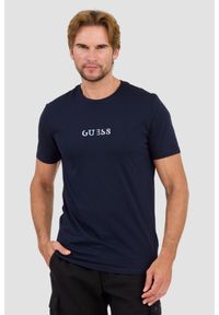 Guess - GUESS Granatowy t-shirt z haftowanym logo. Kolor: niebieski. Wzór: haft