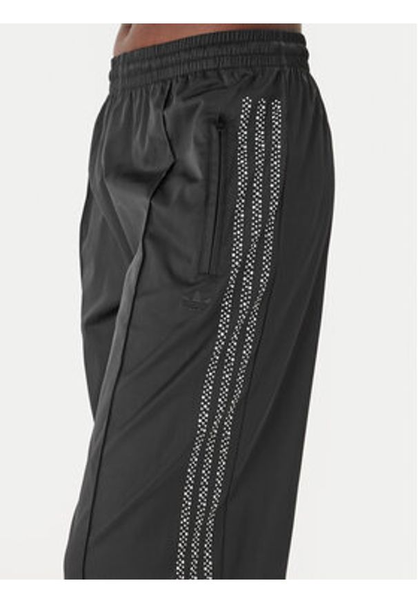 Adidas - adidas Spodnie dresowe Pearl Firebird KC7863 Czarny Loose Fit. Kolor: czarny. Materiał: syntetyk