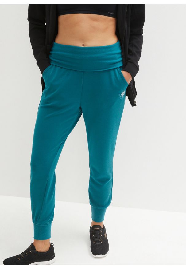bonprix - Bardzo miękkie spodnie haremki z domieszką modalu. Kolor: niebieski. Wzór: prążki