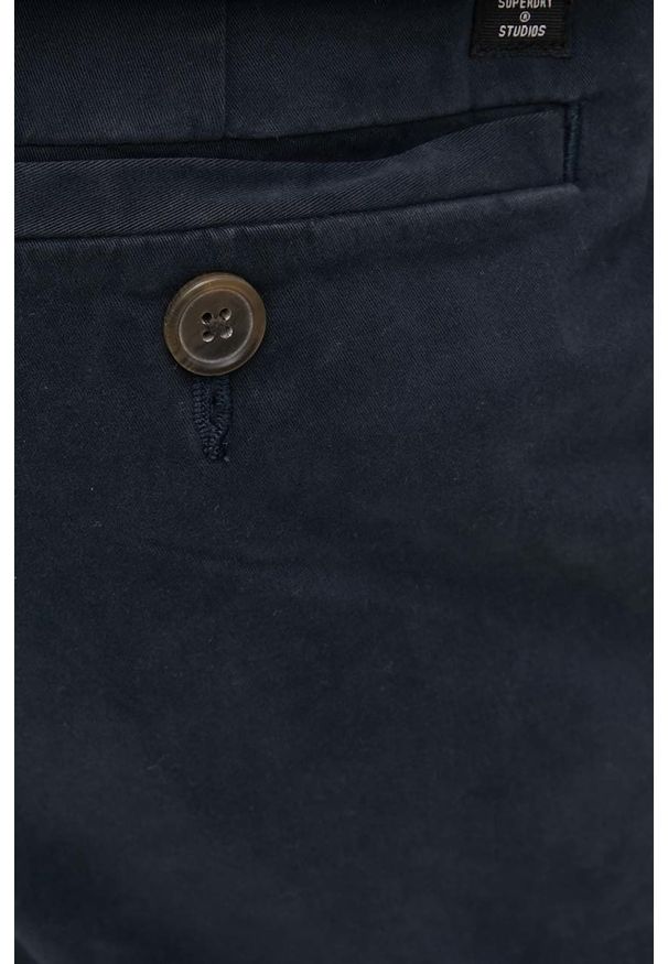 Superdry spodnie męskie kolor granatowy w fasonie chinos. Kolor: niebieski. Materiał: bawełna, tkanina. Wzór: gładki