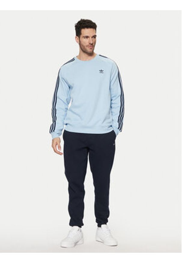 Adidas - adidas Bluza adicolor Classics 3-Stripes JN7026 Błękitny Regular Fit. Kolor: niebieski. Materiał: bawełna