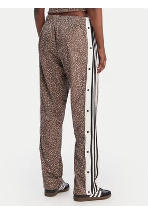 Adidas - adidas Spodnie dresowe Adibreak KD8820 Beżowy Loose Fit. Kolor: beżowy. Materiał: syntetyk