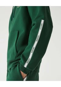 Lacoste - LACOSTE - Zielona bluza z logowaną lamówką. Kolor: zielony. Materiał: bawełna