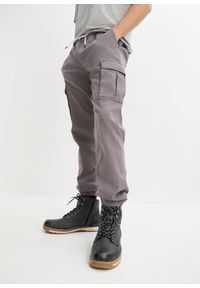 bonprix - Spodnie z gumką w talii i kieszeniami z boku nogawki, ze stretchem, Slim Fit Straight. Kolor: szary. Materiał: materiał