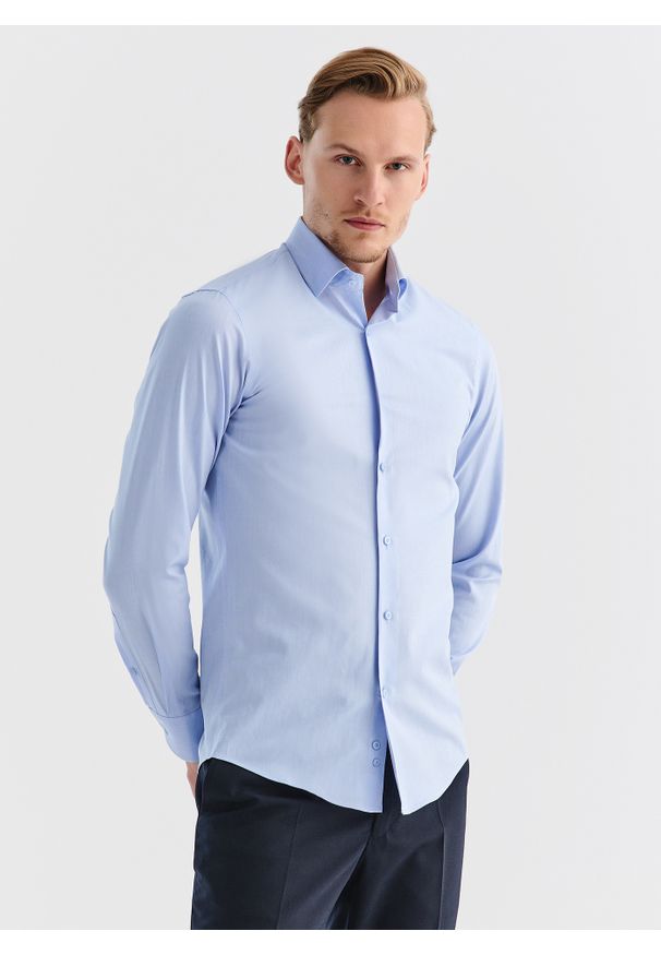 Pako Lorente - PAKO LORENTE – Gładka elegancka koszula męska w kolorze błękitnym. Typ kołnierza: kołnierzyk klasyczny. Kolor: niebieski. Materiał: bawełna. Długość rękawa: długi rękaw. Długość: długie. Wzór: gładki. Styl: elegancki