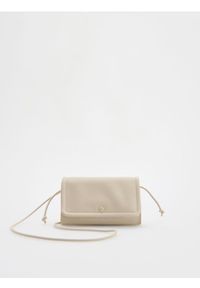 Reserved - Torebka crossbody - beżowy. Kolor: beżowy. Materiał: skórzane