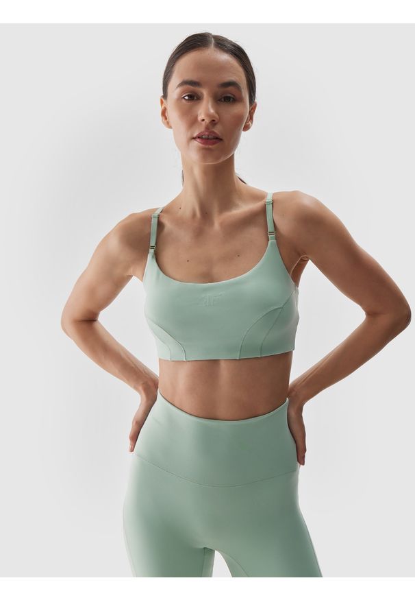 4f - 4F Biustonosz do jogi i pilatesu z niskim wsparciem - turkusowy XS. Kolor: turkusowy. Materiał: syntetyk, włókno, dzianina, materiał, elastan, guma. Rodzaj stanika: wyciągane miseczki. Wzór: jednolity, gładki, ze splotem. Sport: joga i pilates