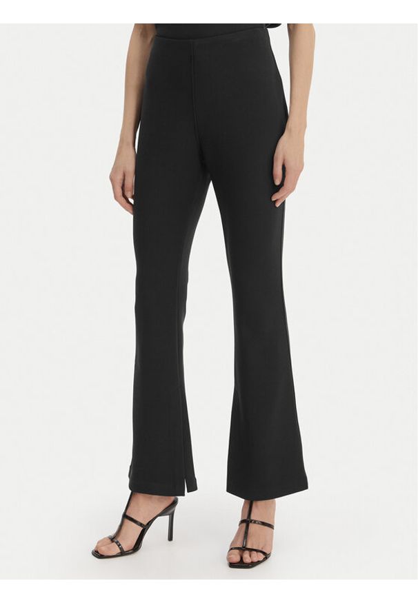 Calvin Klein Spodnie materiałowe LV044B223G Czarny Flare Fit. Kolor: czarny. Materiał: syntetyk