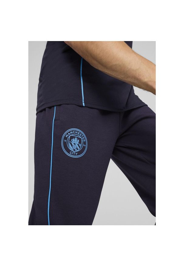 Puma - Męskie spodnie Casuals Manchester City PUMA New Navy Magic Blue. Kolor: niebieski. Materiał: dresówka