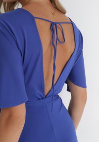 Born2be - Granatowy Długi Kombinezon z Kopertowym Dekoltem i Ozdobnym Wiązaniem Abrarani. Okazja: na spotkanie biznesowe. Kolor: niebieski. Długość: długie. Styl: biznesowy, elegancki #3