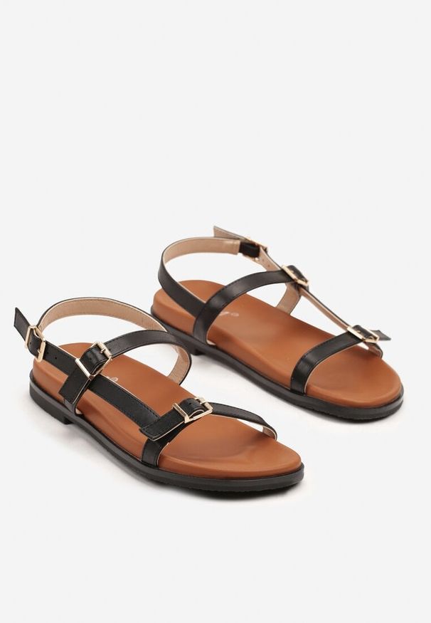 Renee - Czarne Płaskie Sandały Ozdobione Klamrami Ilanelia. Okazja: na co dzień. Zapięcie: klamry. Kolor: czarny. Wzór: aplikacja. Styl: elegancki, casual
