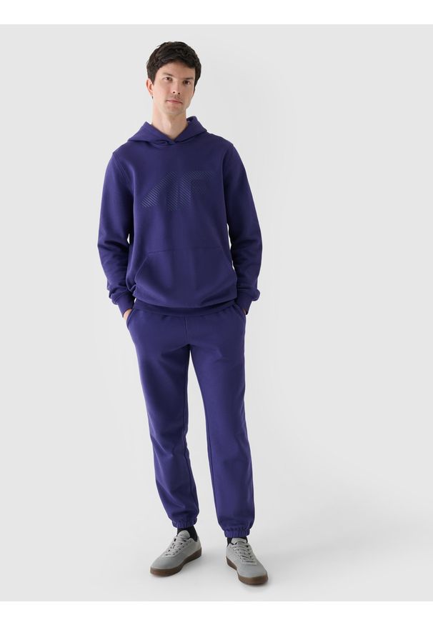 4f - 4F Spodnie dresowe joggery męskie - granatowe XL. Kolor: niebieski. Materiał: dresówka. Wzór: ze splotem, gładki