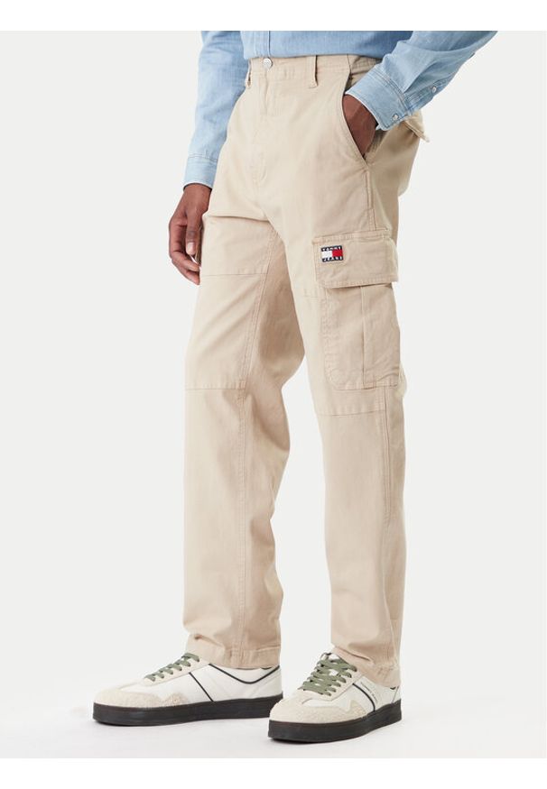 Tommy Jeans Spodnie materiałowe Sonny DM0DM22651 Beżowy Slim Fit. Kolor: beżowy. Materiał: bawełna